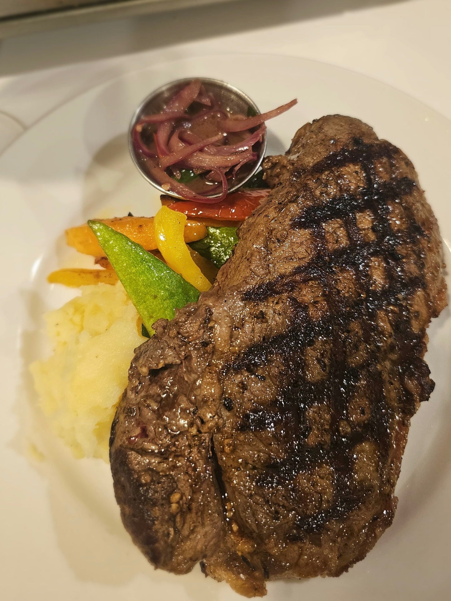 Cast-Iron Grilled Prime New York Strip With Red Wine Reduction and Scotch Bonnet Relish